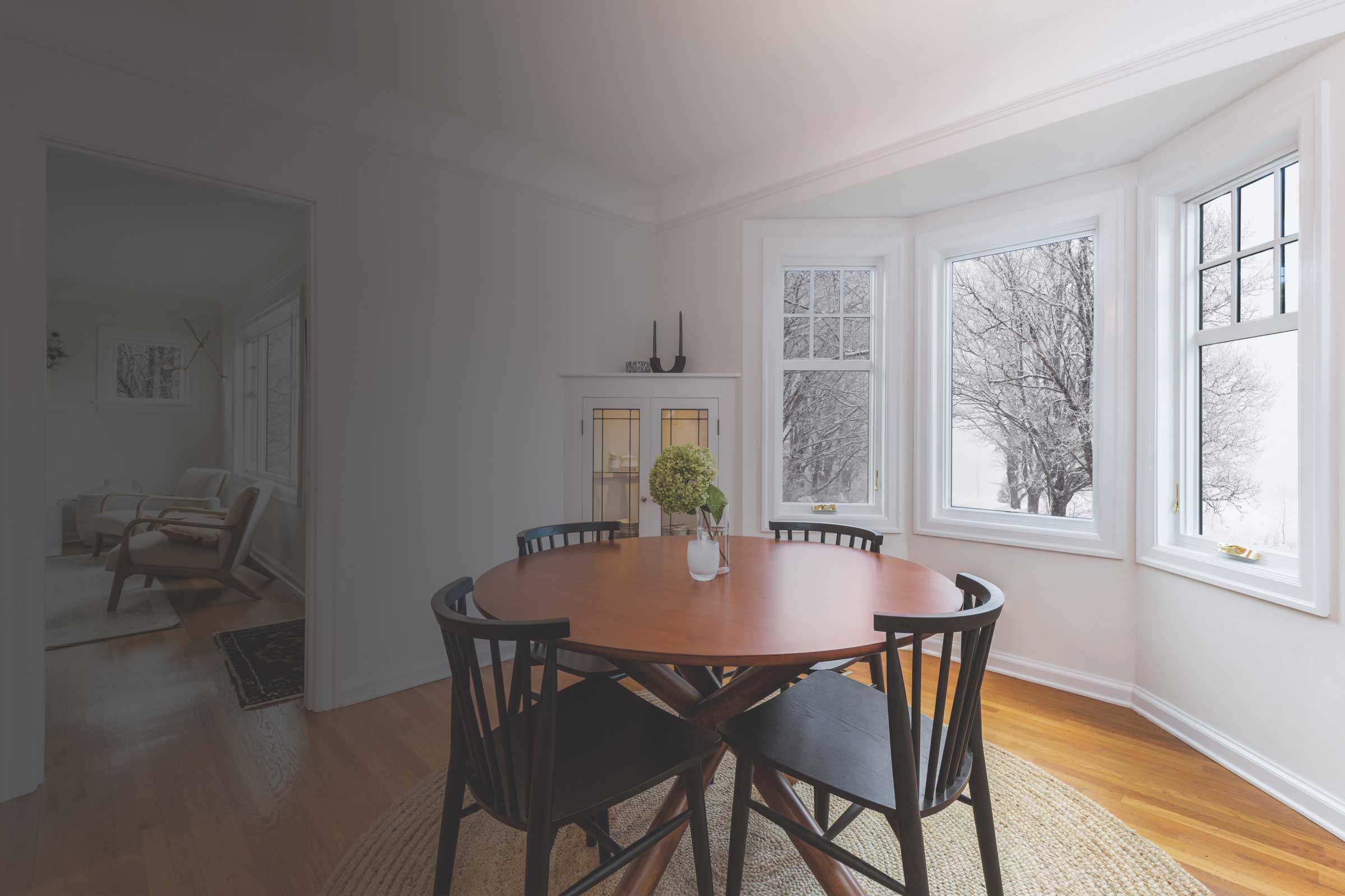 Dining room with white Infinity from Marvin replacement windows
