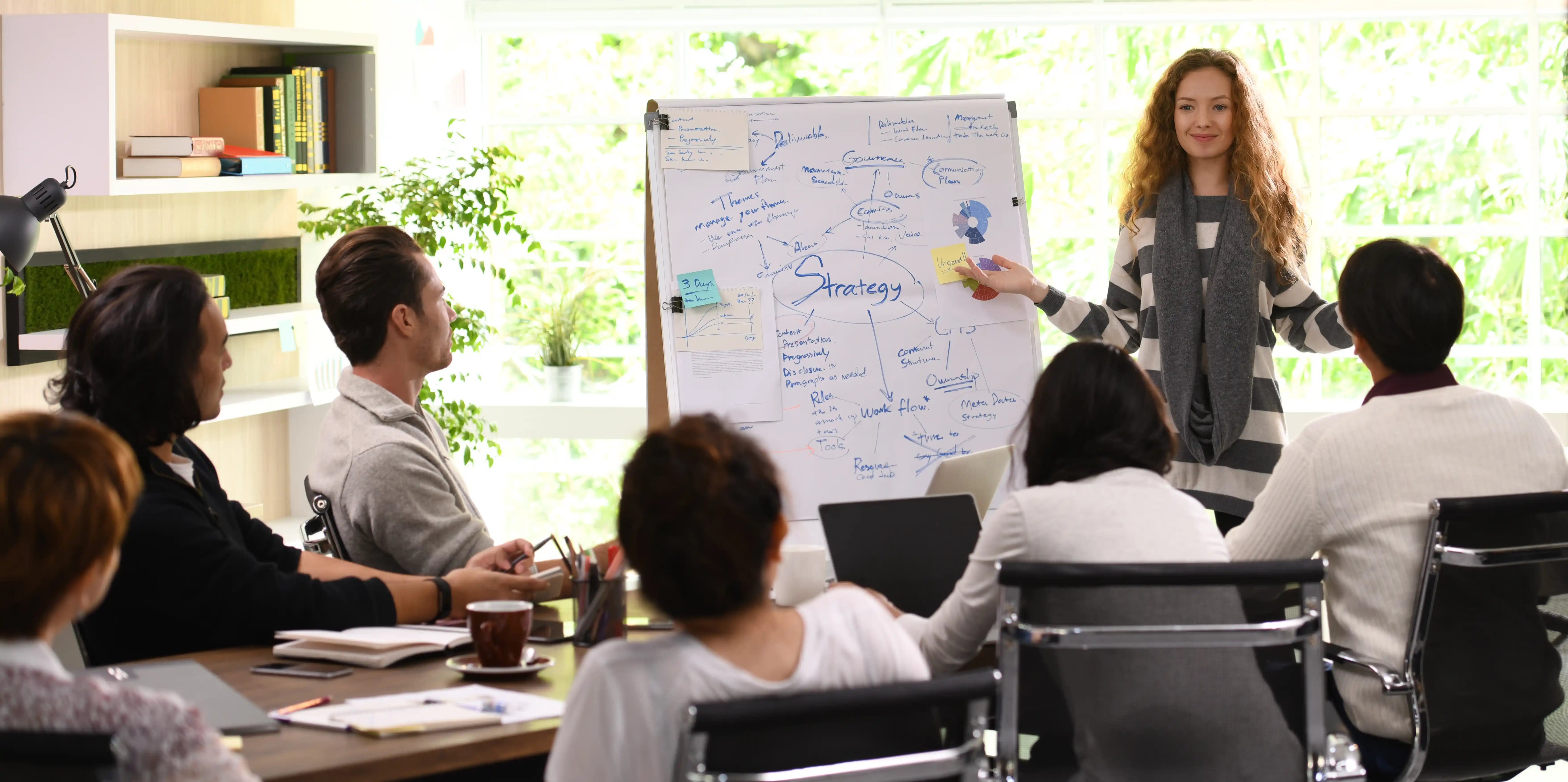 group of people discussing the business strategy
