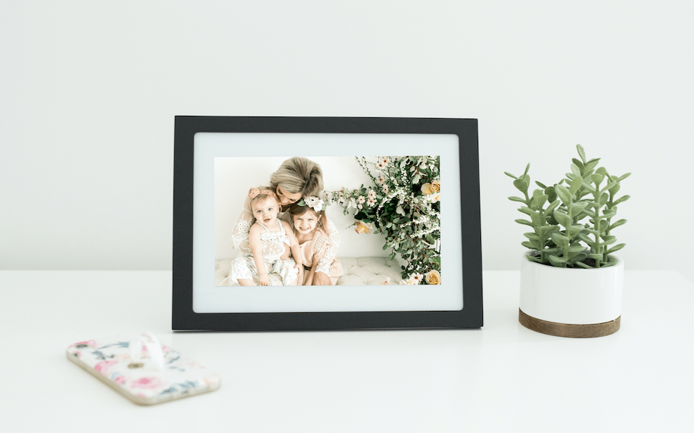 Image of a happy family on digital photo frame