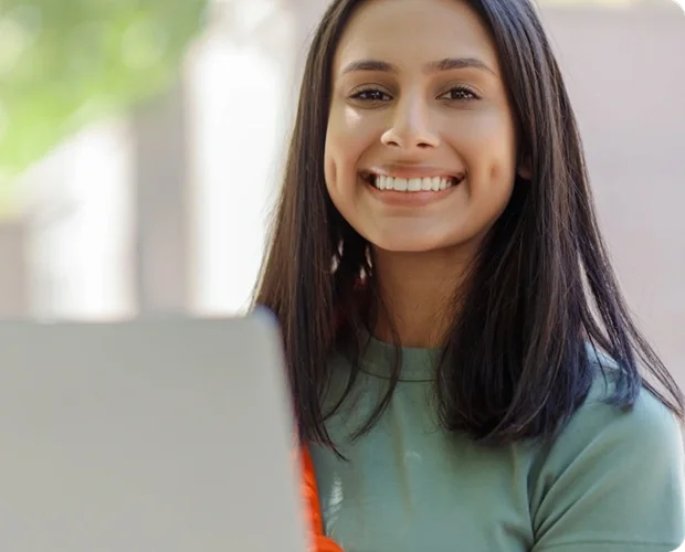 Logistics agent representative smiling at desk