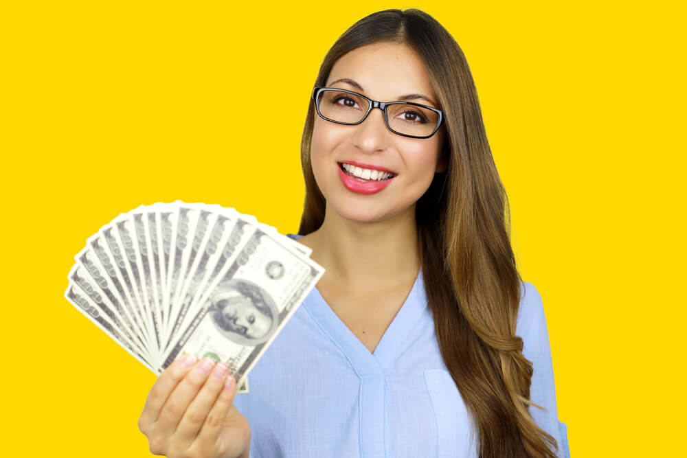 woman with payday loan cash 