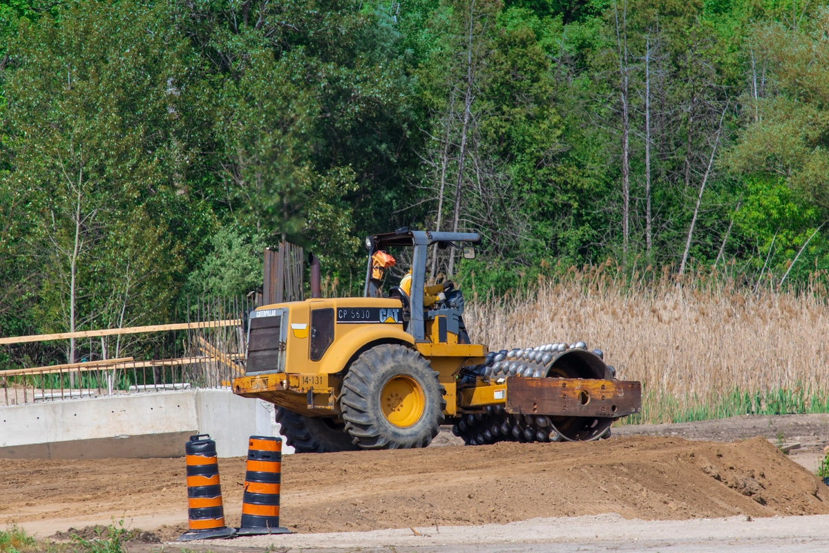 1 Different types of compactors: a) Pad-foot or tamping-foot roller, b)