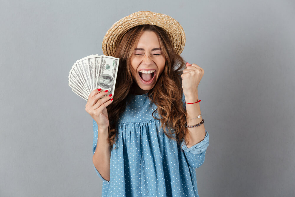 happy girl with money