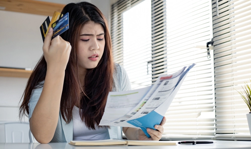 Woman reviewing her bills