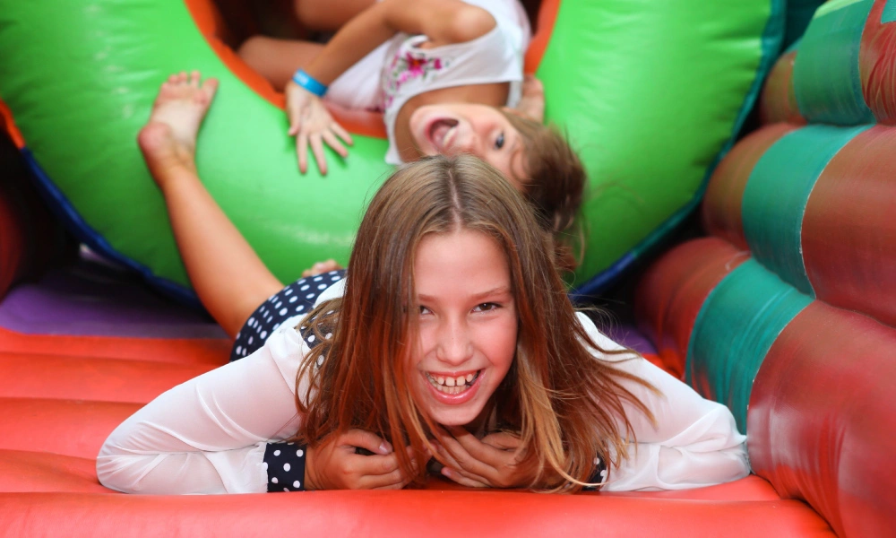 Kids Playing in Inflatable bounce house