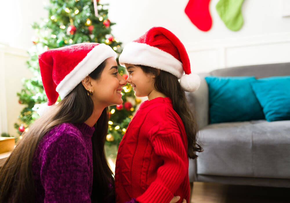 A mother embraces her daughter after saving during the holidays with payday loans