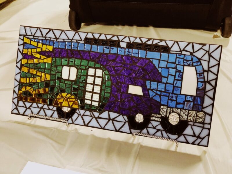 A mosaic picture of a bus