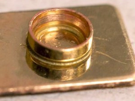 Gold filled bezel soldered to a gold filled sheet