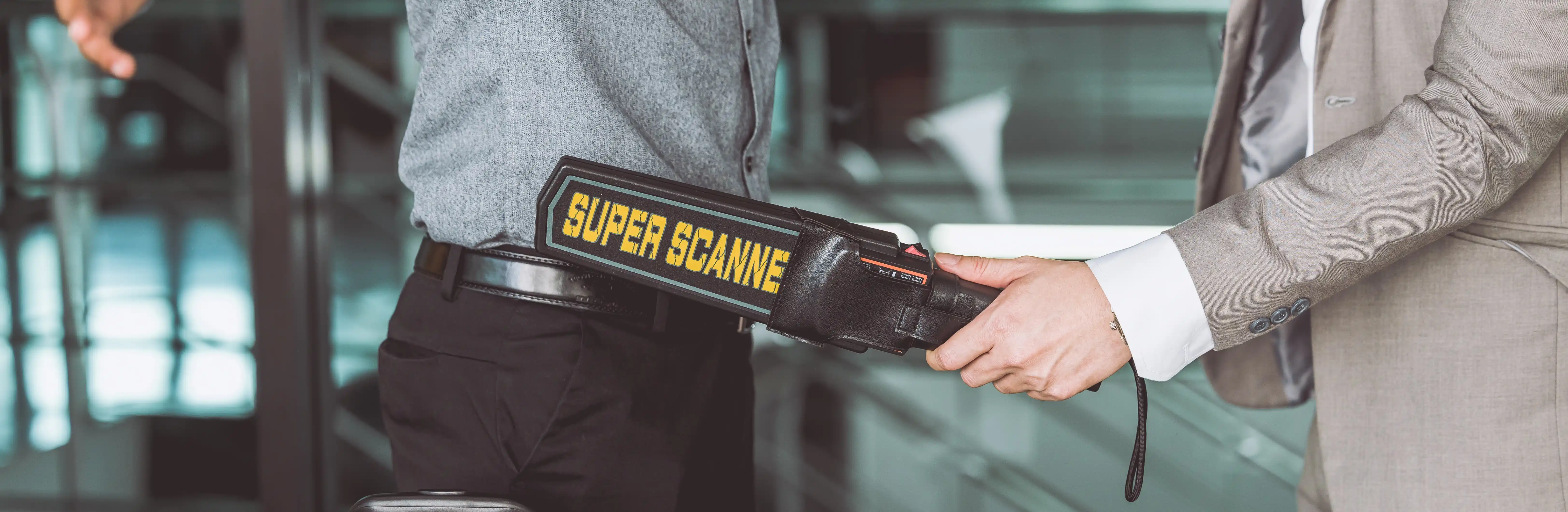 security check officer using scanner