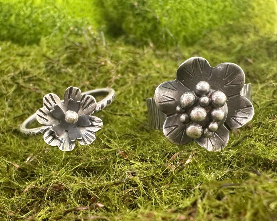 Texturing flower blanks - two flower blank rings with stamped textures on the petals
