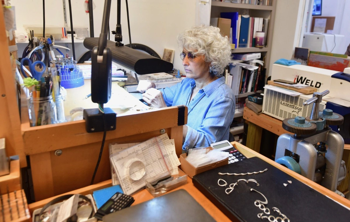 Ayesha Mayadas working at her bench