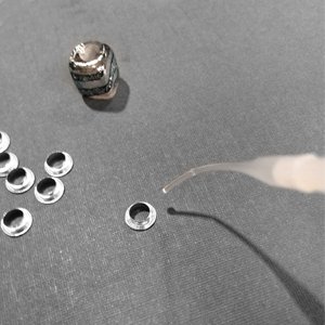Gluing a sterling silver grommet