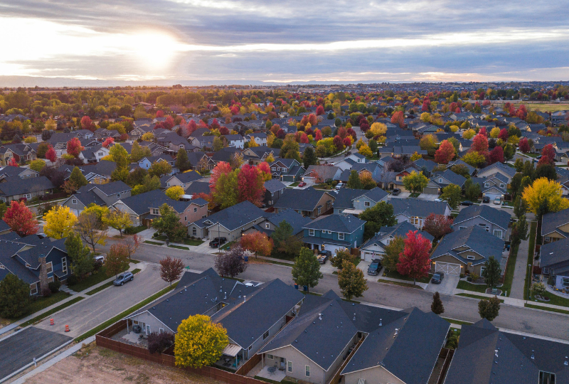 Aerial view of neighborhood with fall foliage