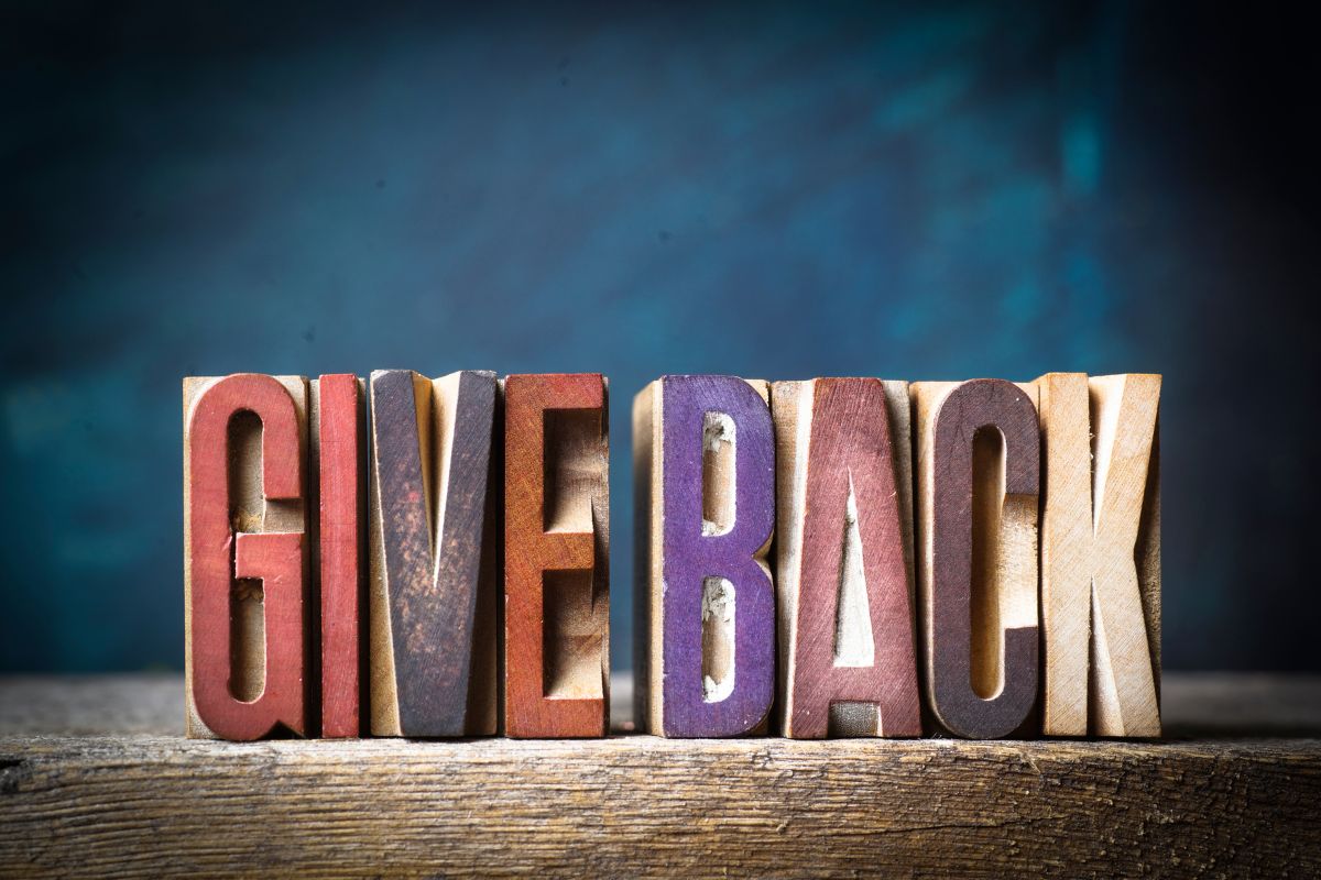 giveback written on wood blocks