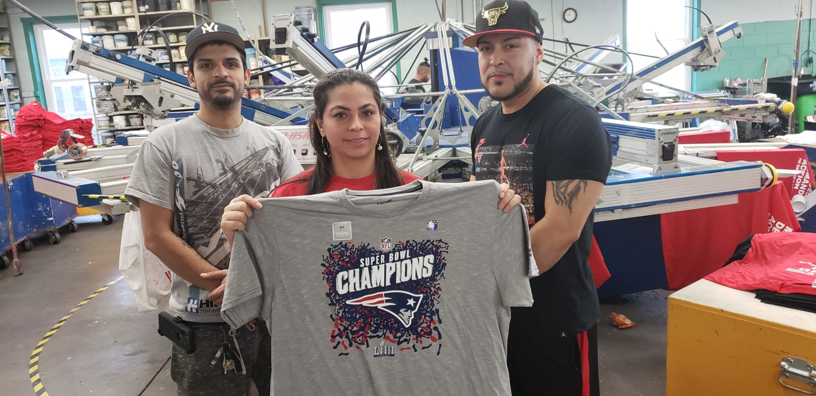 Screen printing shirts for the New England Patriot's Super Bowl victory