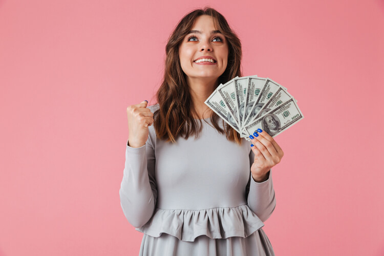 title loan places tips to avoid financial emergency happy woman with cash