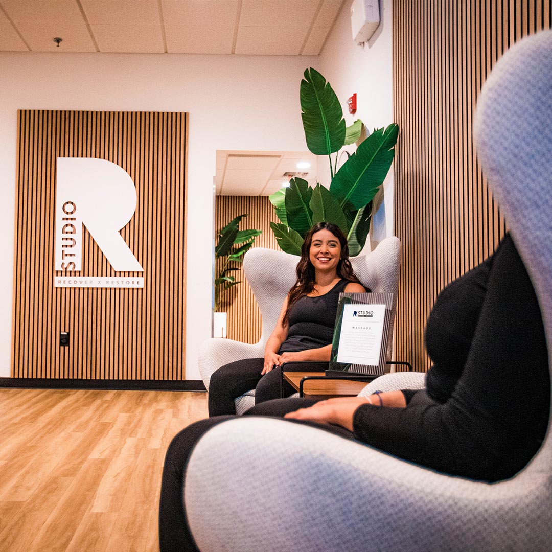 women sitting in R Studio lounge chairs