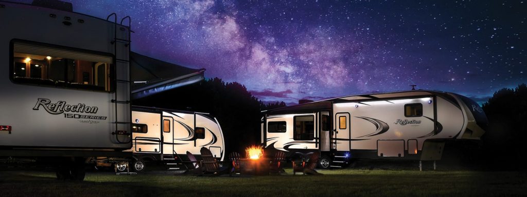 rvs at night with stary sky