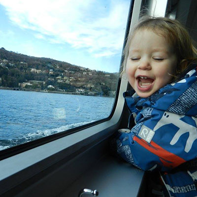 Little girl on boat ride around Lake Como