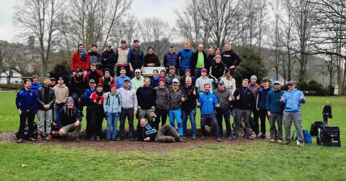 A group of people posing for a group photo