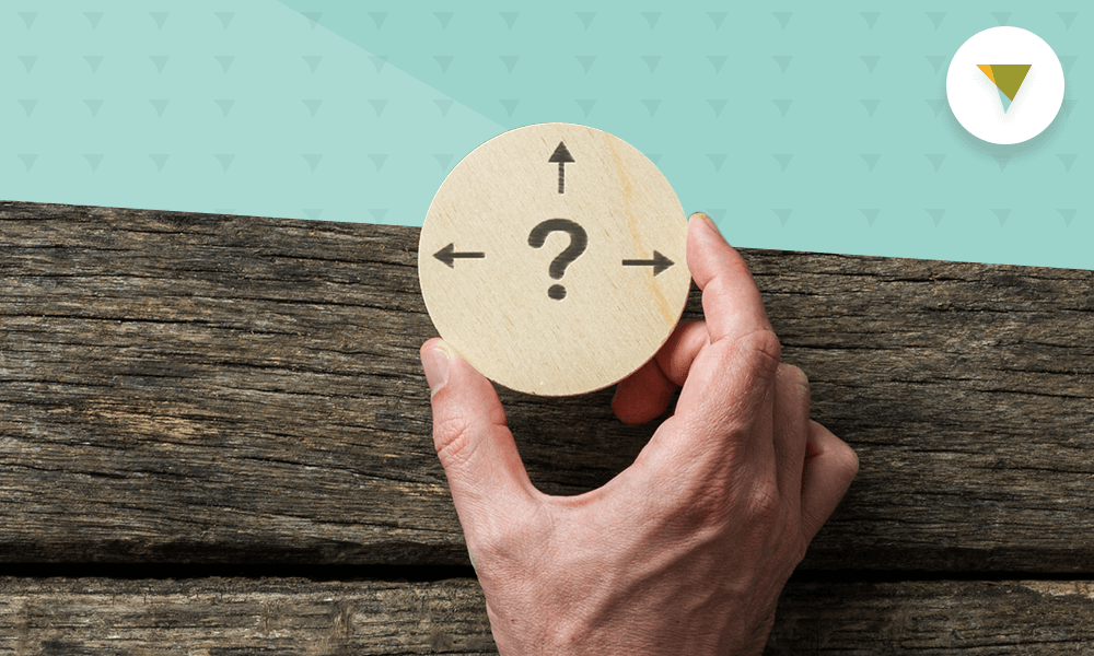 Hand holding compass