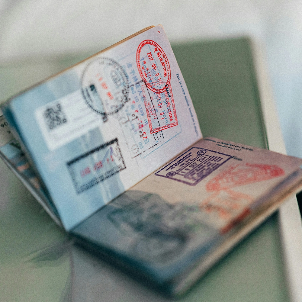 Stamped passport on a table.