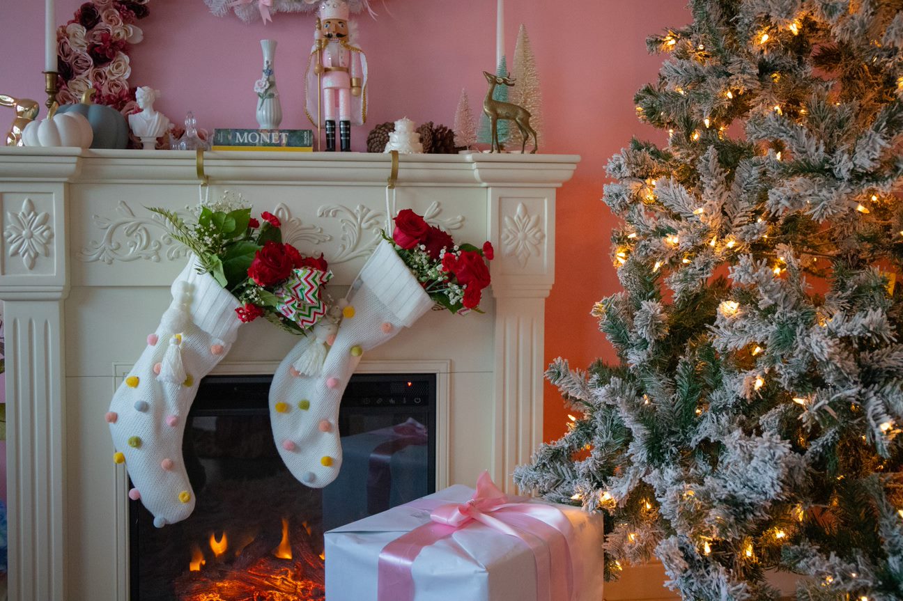 Christmas stockings, Christmas tree, fireplace, and present