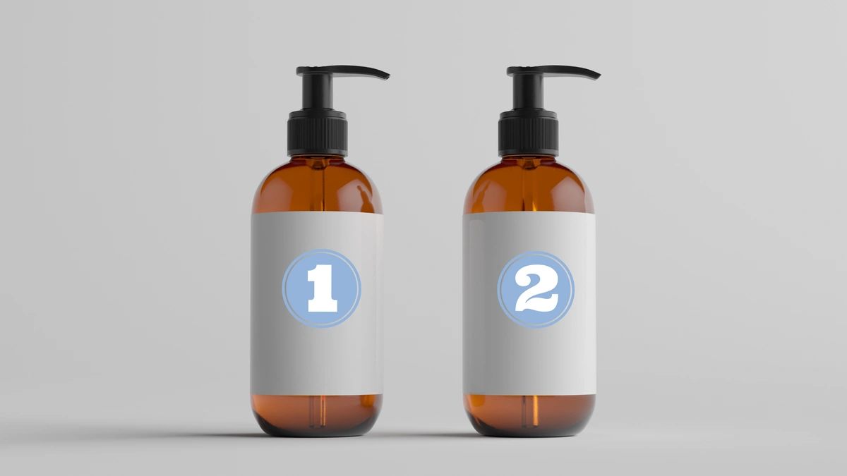 2 face wash bottles. One has a 1 on it and one has a 2 on it.