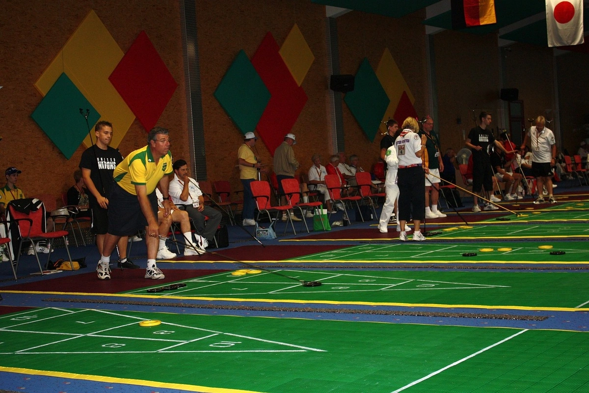 People playing shuffleboard