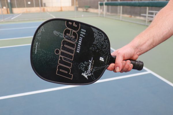 Photo of a Man Holding Pickleball Paddle