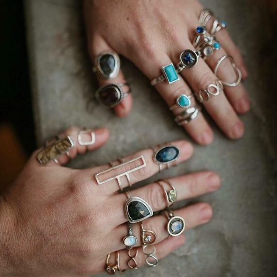 Lisa showing many of her ring designs