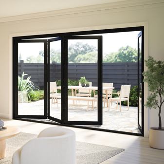 Infinity from Marvin bi-fold door opening to backyard with lawn furniture
