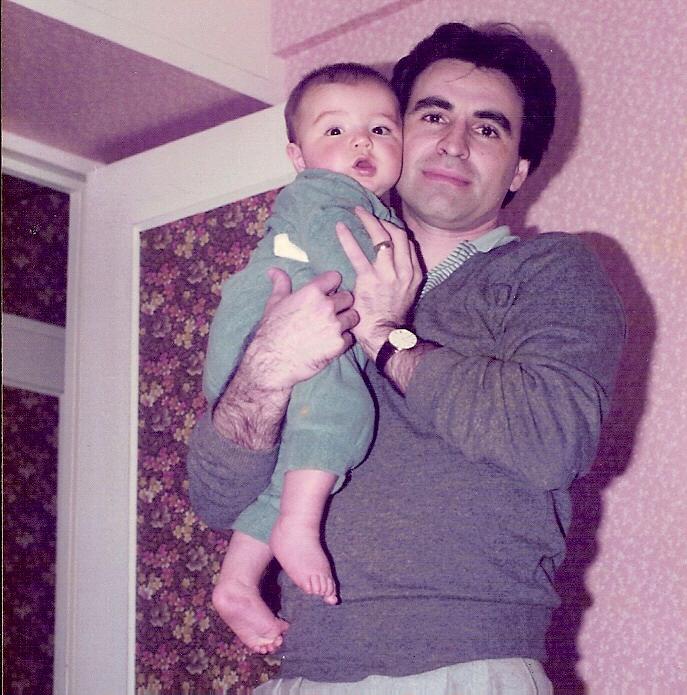 man holding baby