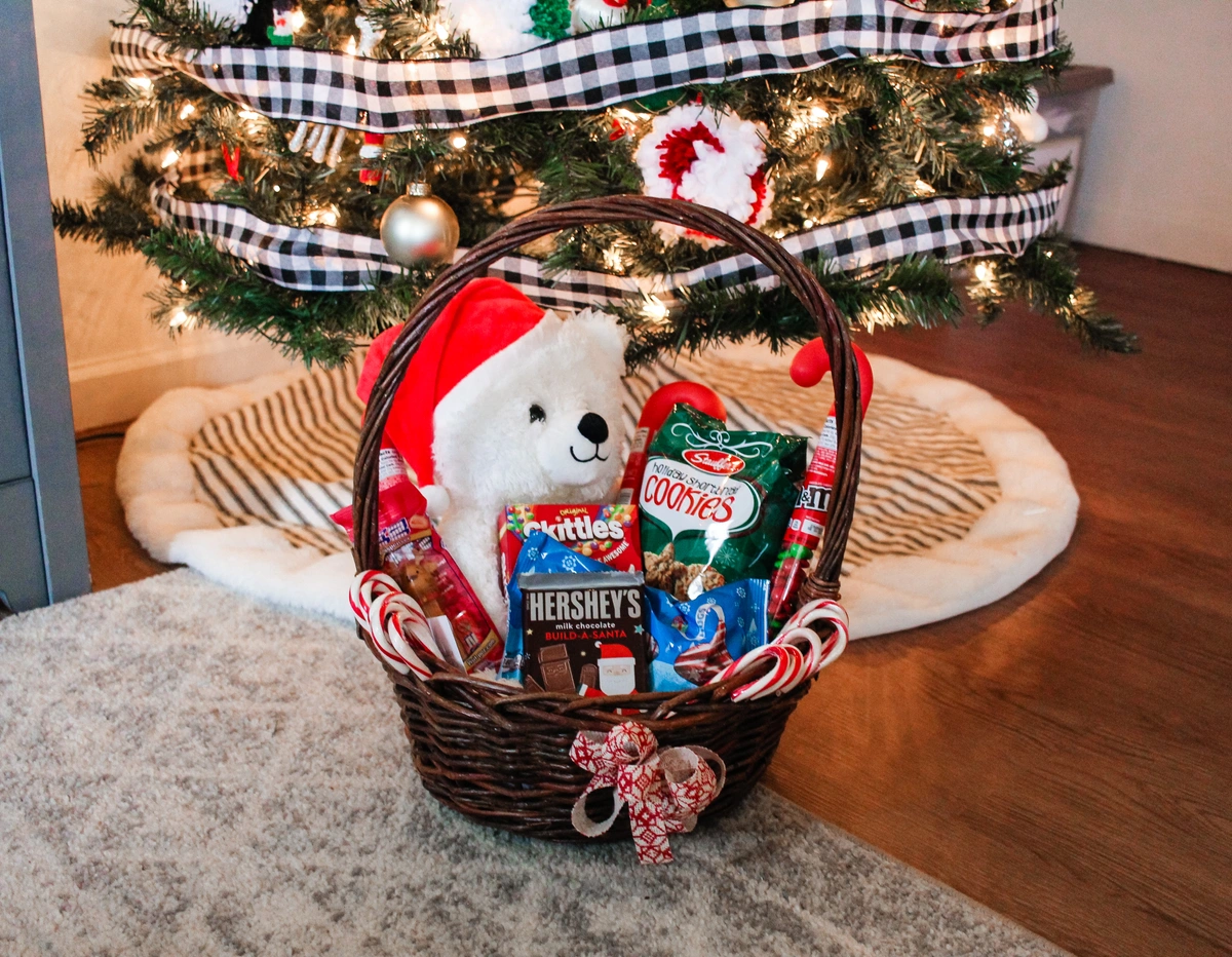 Christmas gift basket by Christmas tree