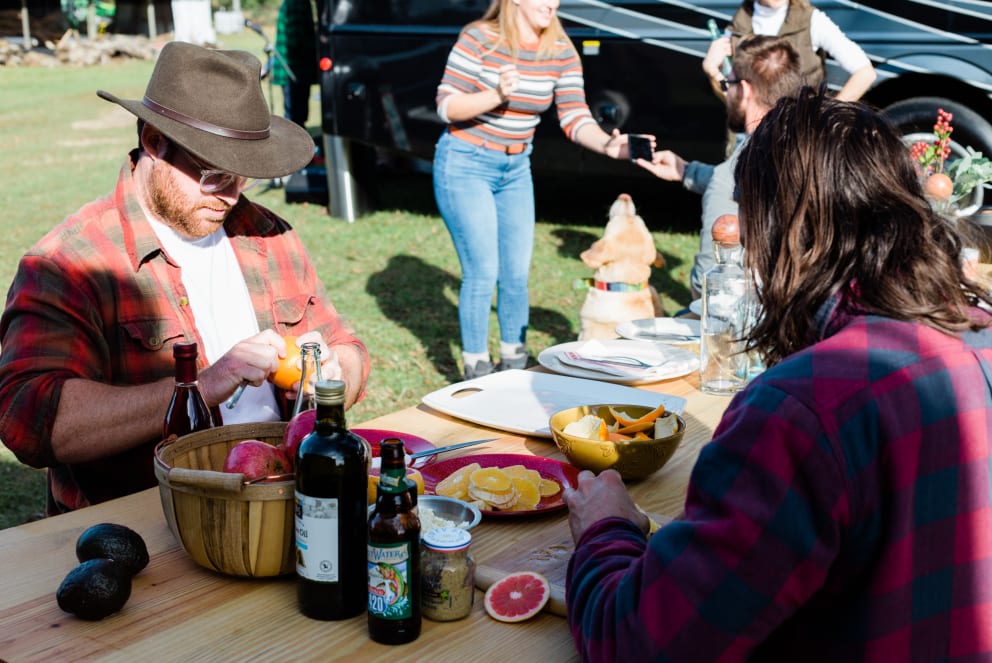 friends making desert at RV campground