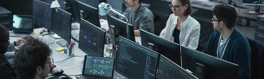 cybersecurity professionals working in an office