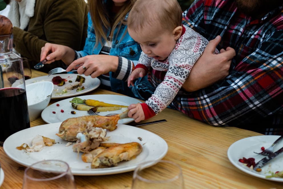 baby picking at christmas dinner