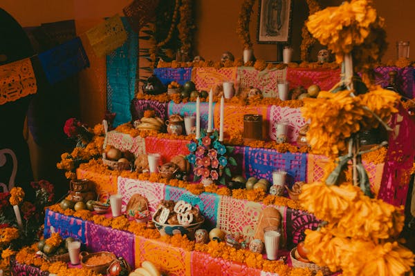 altar with decorations for dia de los muertos