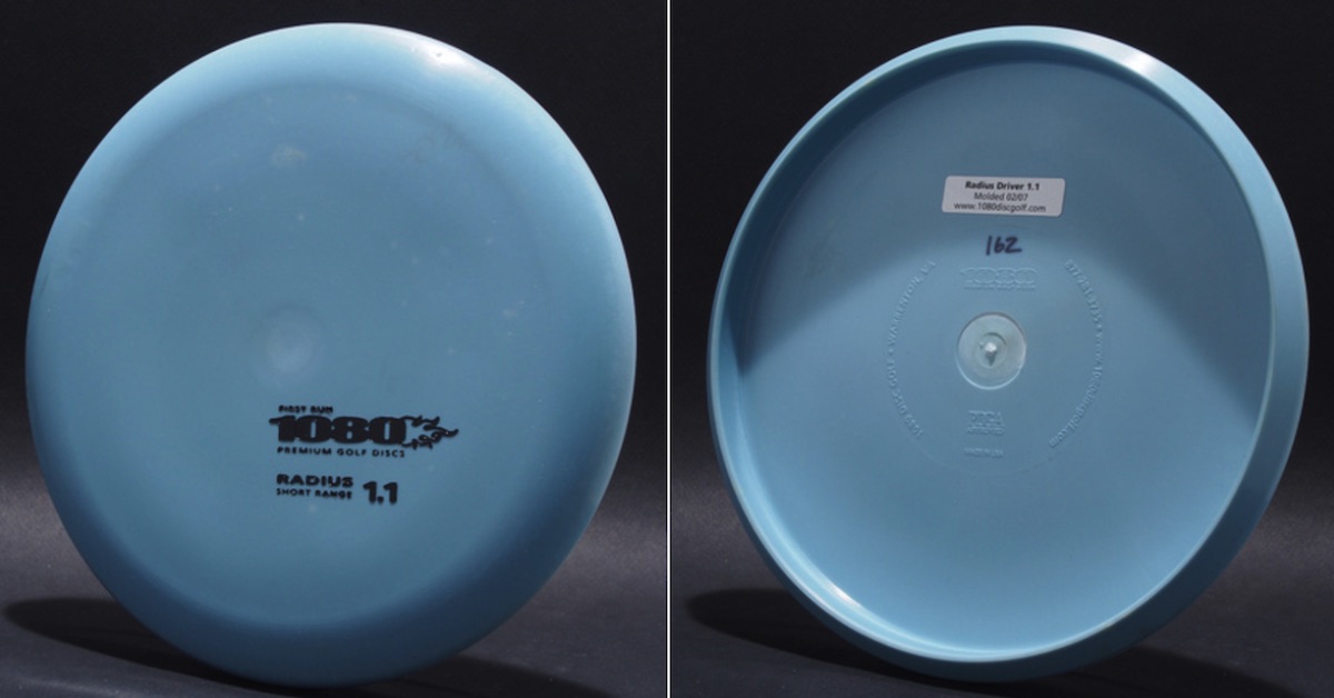 A light blue disc that says 1080 in small black print on its front. Disc seen from top and bottom.