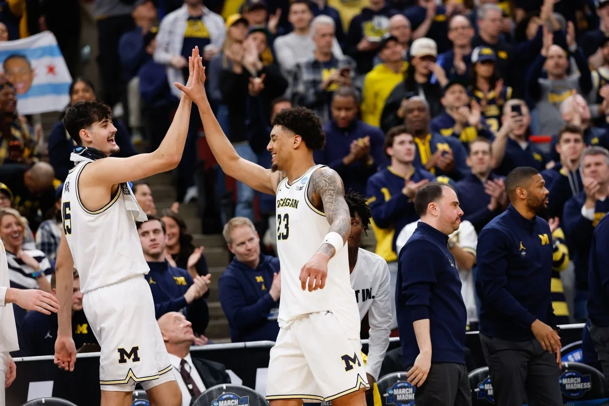 Mar 29, 2026; Chicago, IL, USA; Michigan Wolverines center Aday Mara (15) high fives forward Yaxel Lendeborg (23) in the second half against the Tennessee Volunteers during an Elite Eight game of the Midwest Regional of the men's 2026 NCAA Tournament at United Center.