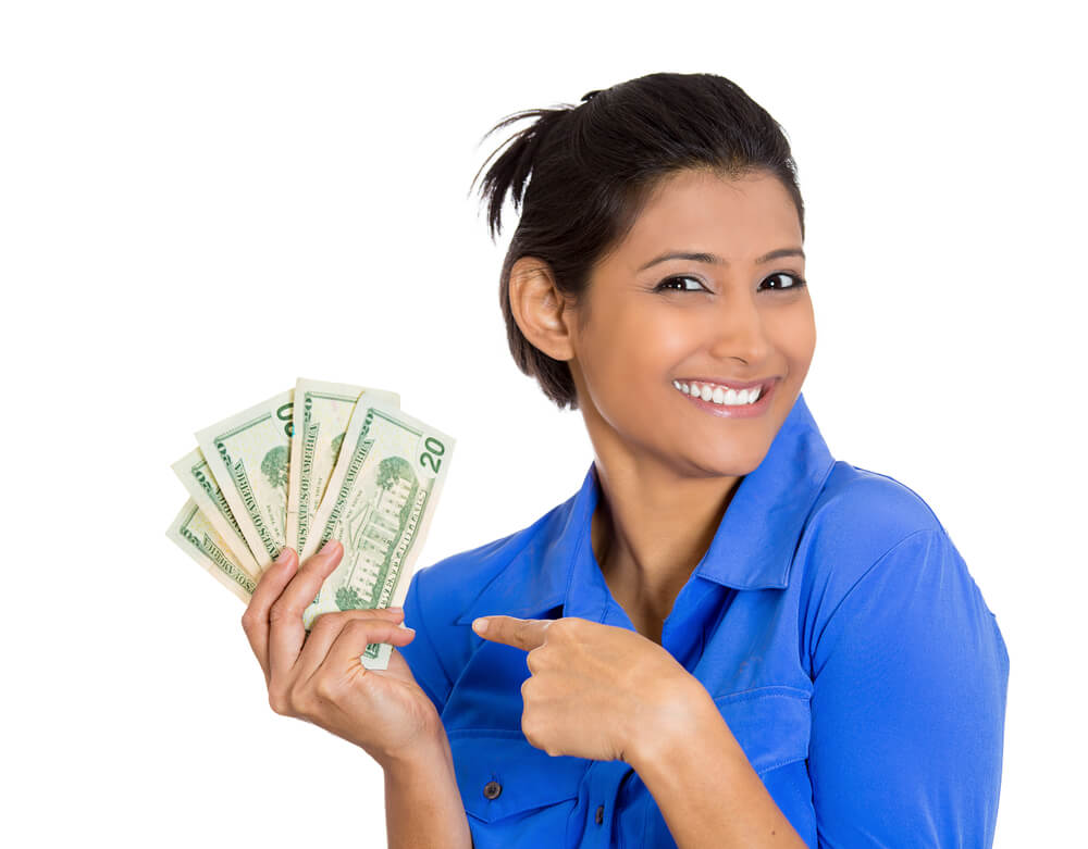 happy woman that is holding successful payday loan cash
