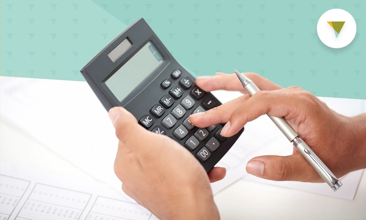 Hands holding a calculator