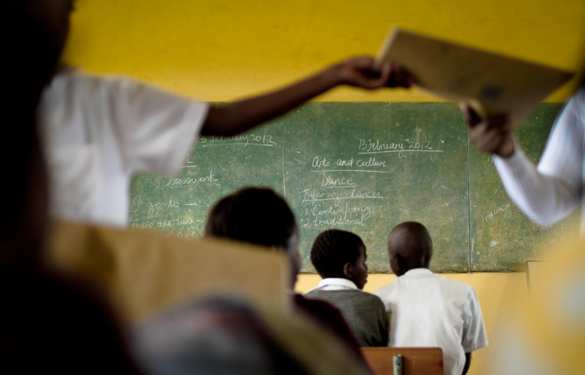 Ensuring the uptake of evidence-based interventions in large-scale education programmes