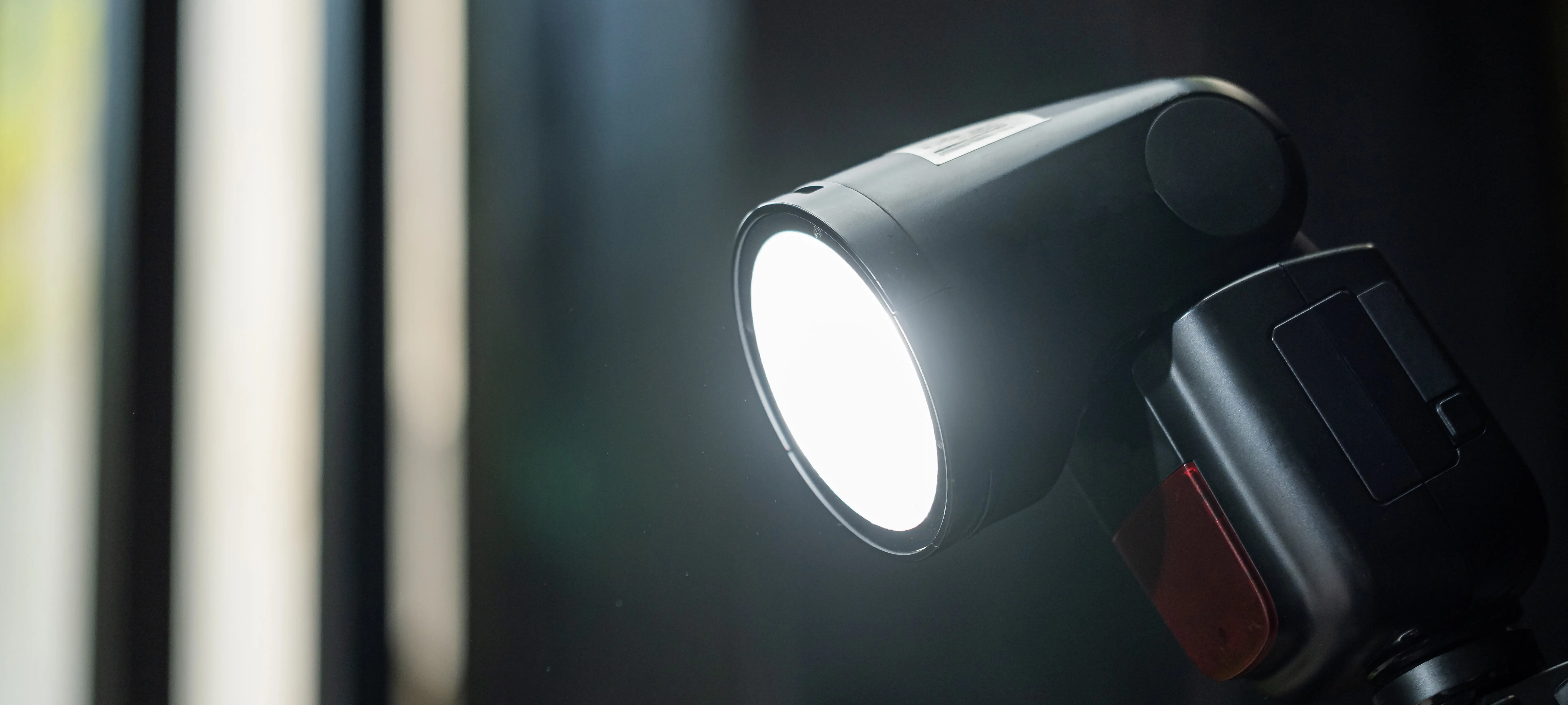 Desk lamp positioned for proper video call lighting in home office