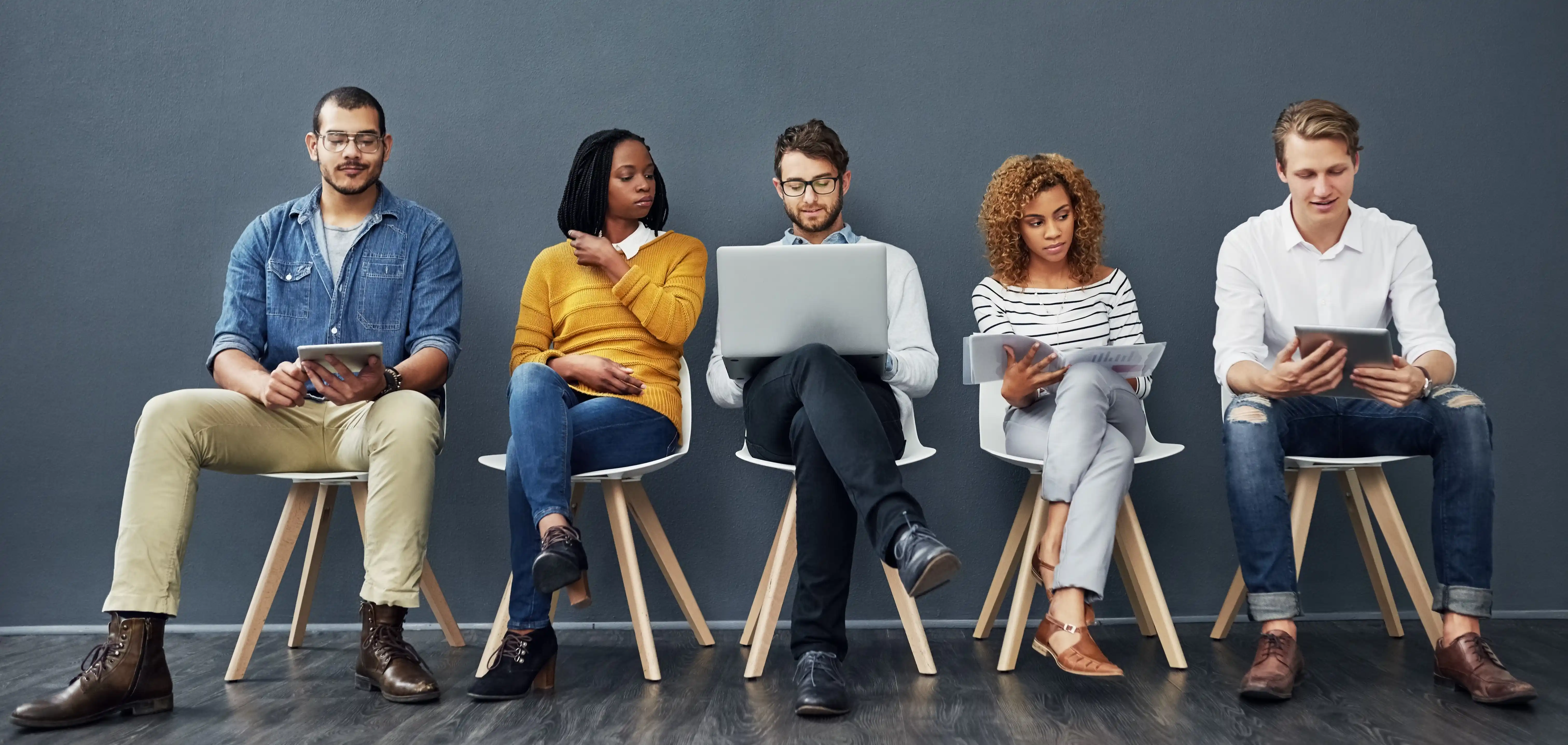 Remote global workforce using digital devices showcasing distributed managed teams