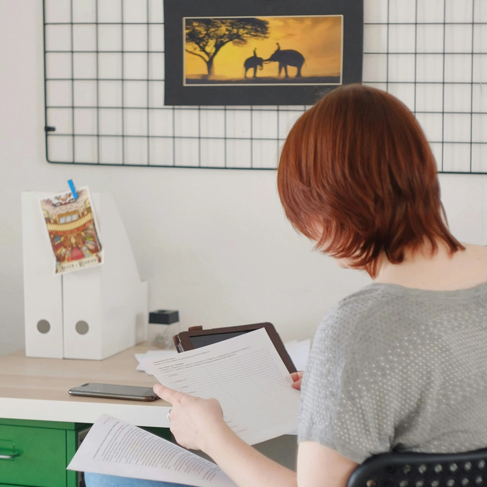 Woman keeping track of travel documents.