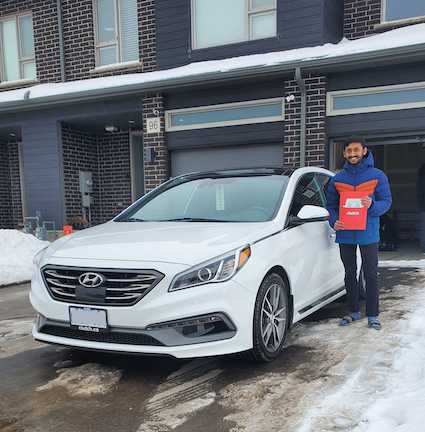 review author with their recently purchased car