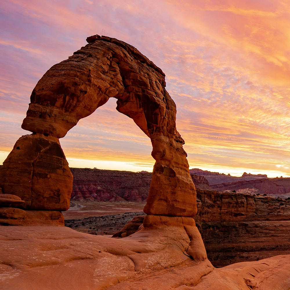 The famous arch in Moab at sunset