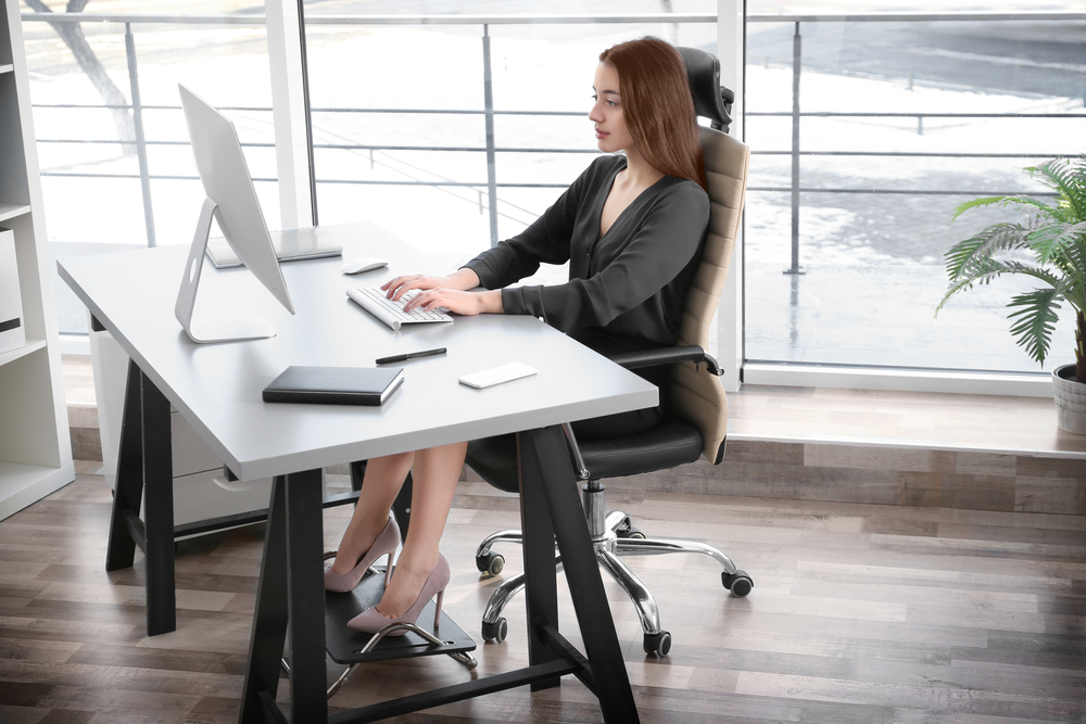 ergonomics and injury prevention - woman working