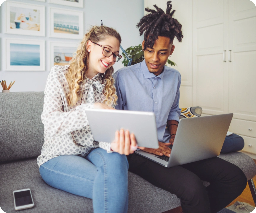 A women with headphones and laptop